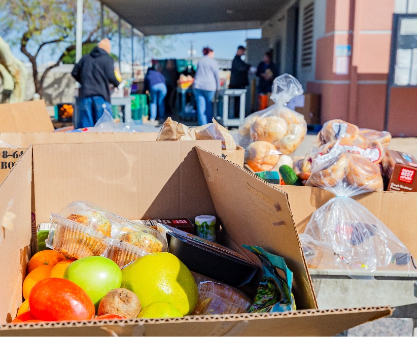 Boxes filled with food donations waiting to be distributed